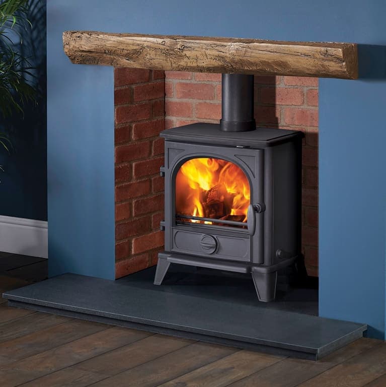 Geocast rustic beam above an eco stove