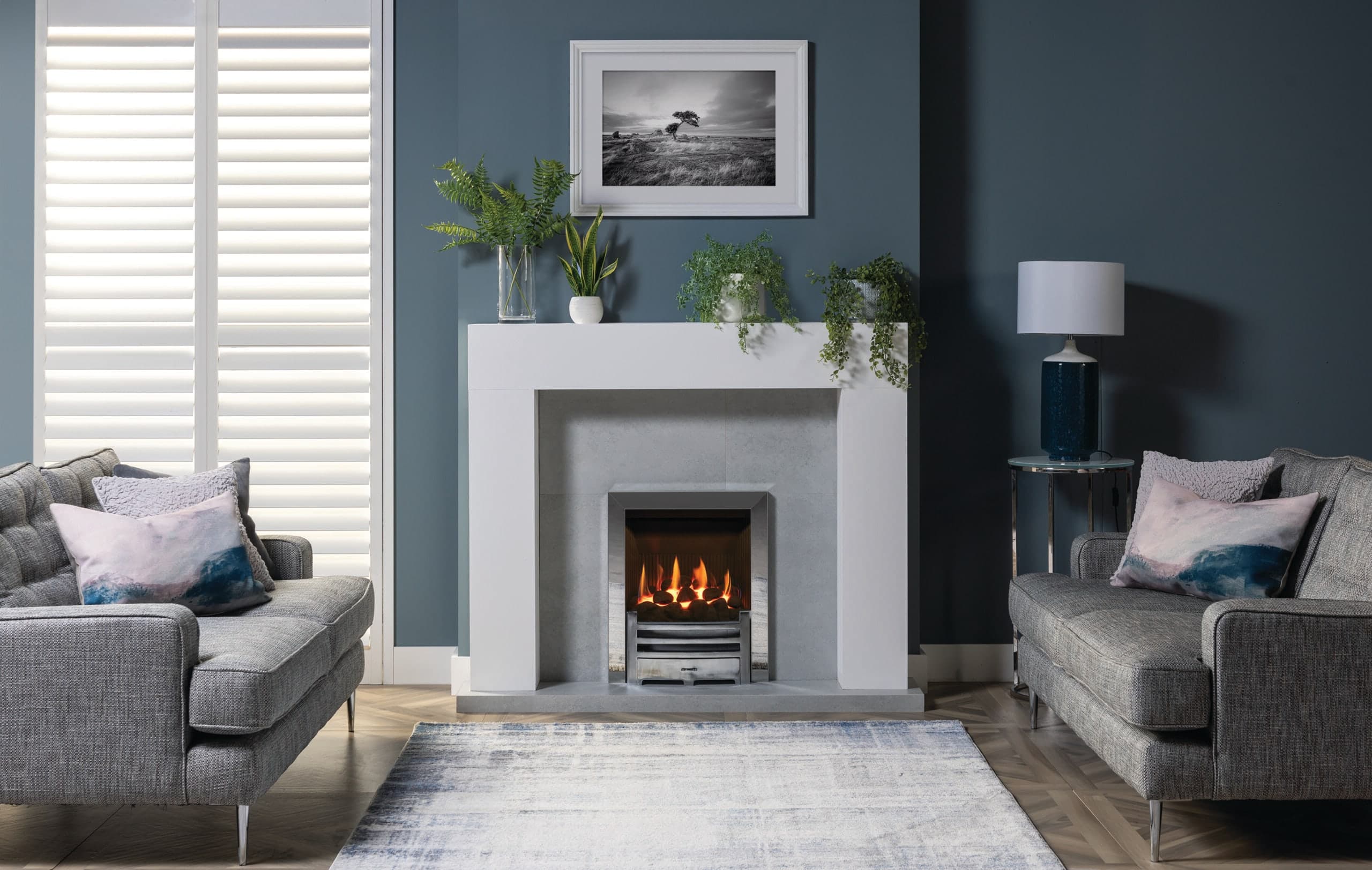 Gazco Logic HE inset gas fire with Arts front and white Malmo mantel